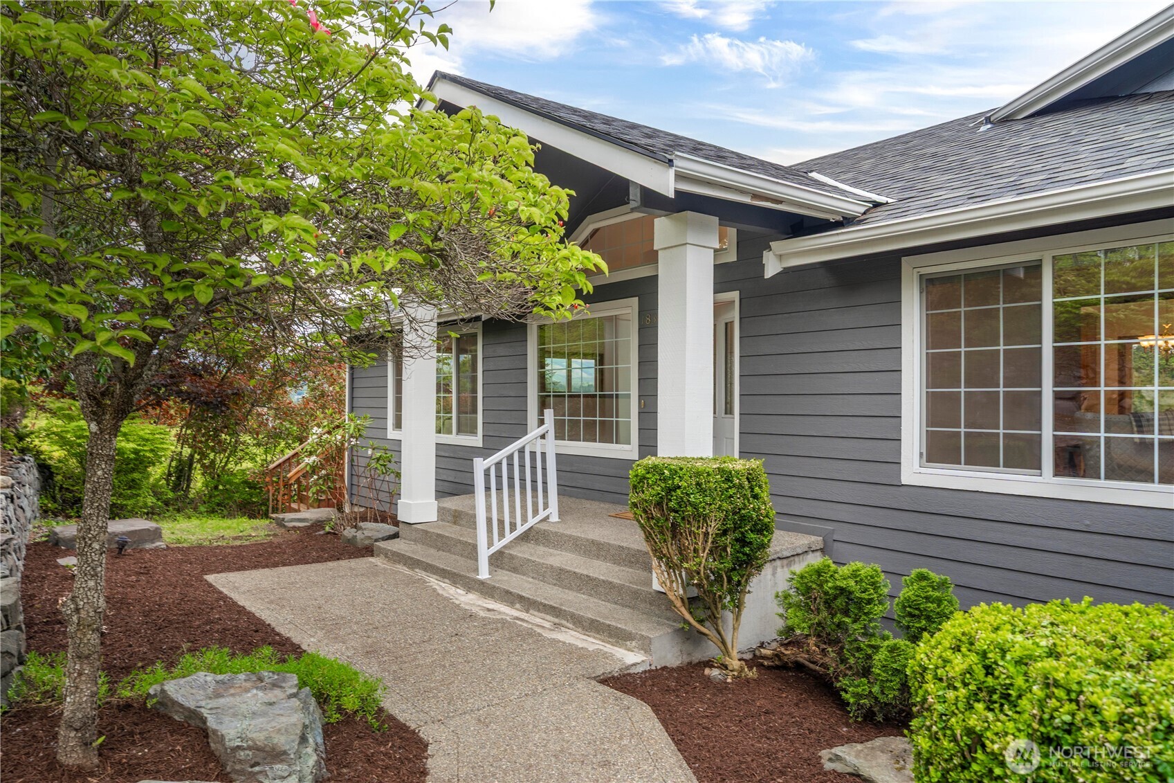183 Dow Ridge Drive North Eatonville, WA 98328 - Photo 5 of 40 a front view of a house with garden