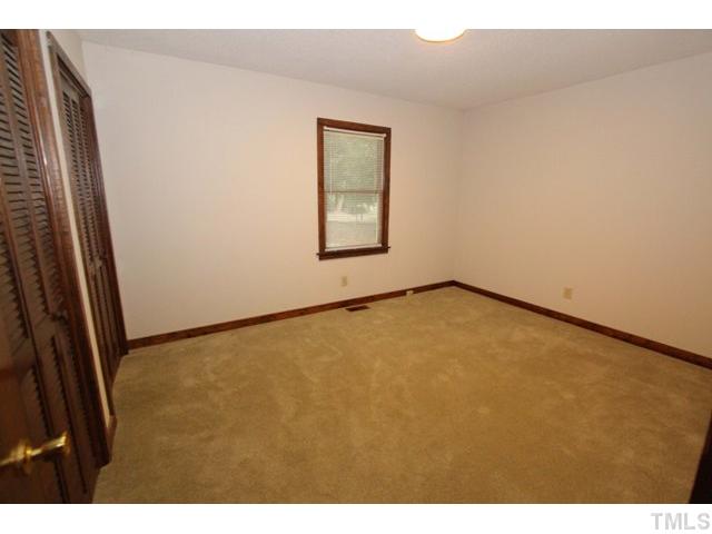 8616 Brandon Station Road Raleigh, NC 27613 - Photo 12 of 18 a view of an empty room