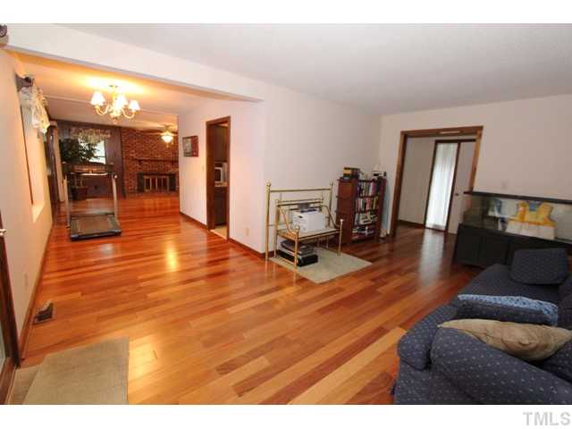 8616 Brandon Station Road Raleigh, NC 27613 - Photo 6 of 18 a view of a living room