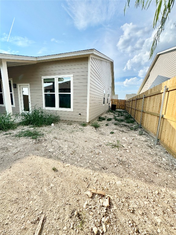 104 Zayd Court, Unit B Jarrell, TX 76537 - Photo 19 of 22 a view of backyard of house