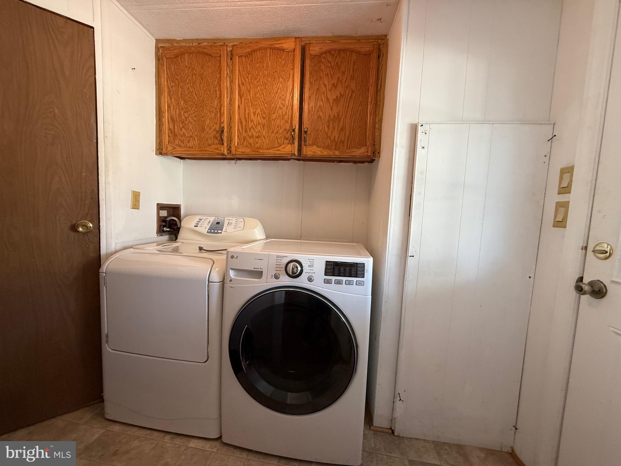 386 Indian Way Buena, NJ 08310 - Photo 33 of 53 a utility room with dryer and washer