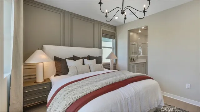 a bedroom with a bed and ceiling fan