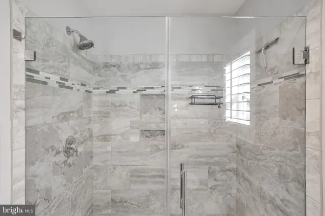 a view of front door with wooden floor