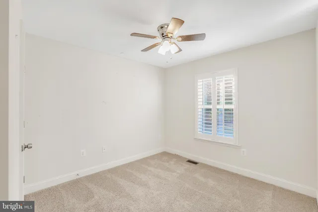 a view of a houses with a yard and lake view