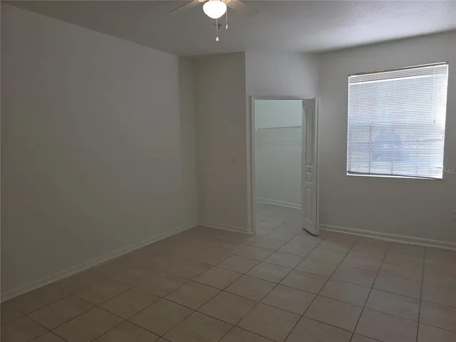 an empty room with white door