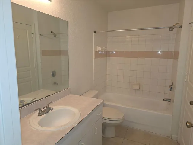 a bathroom with a sink a toilet and a bathtub