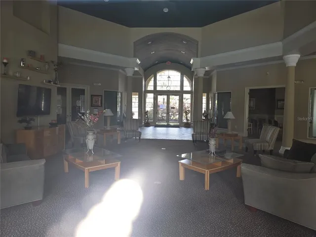 a living room with dining table