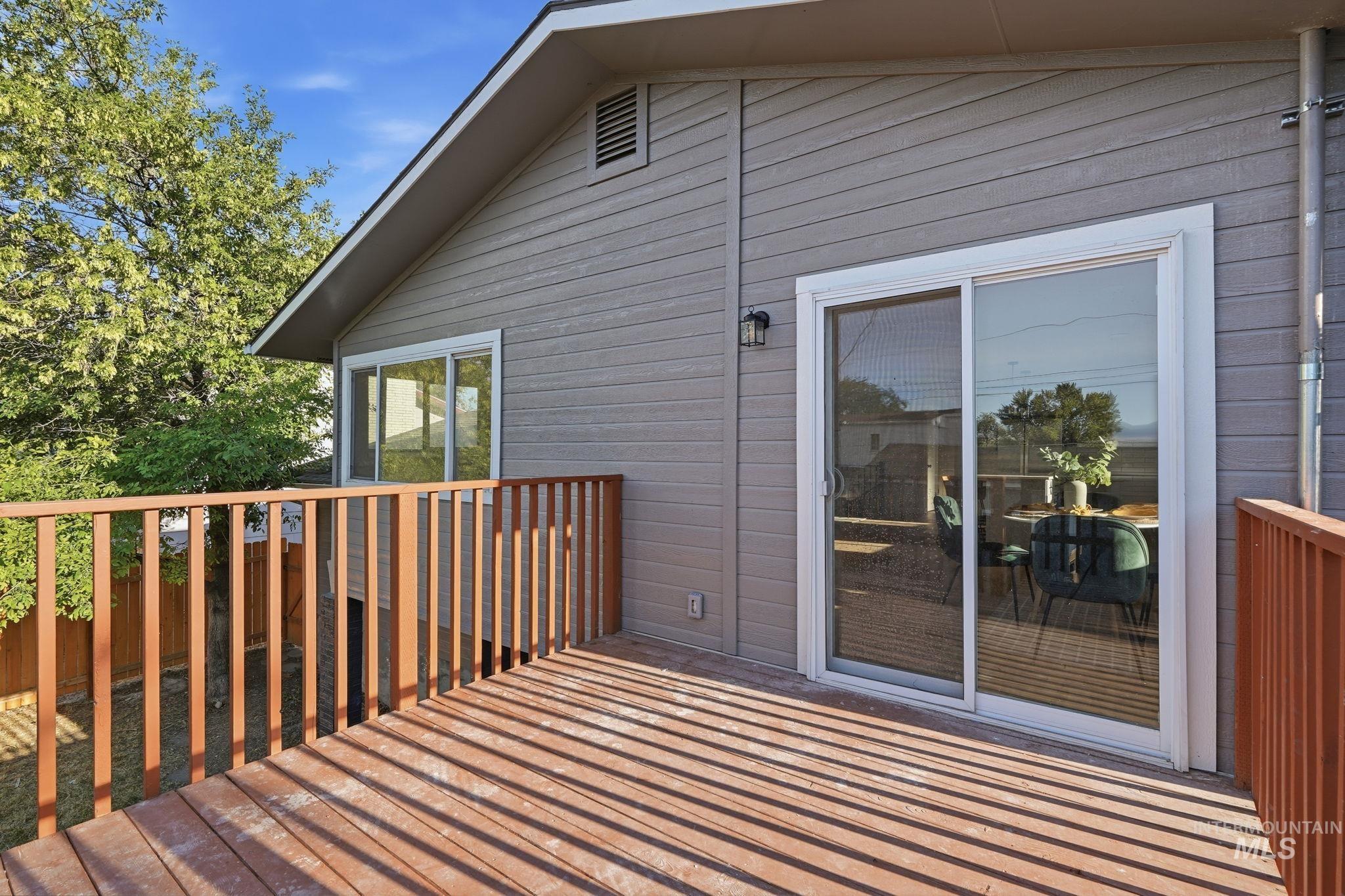 1990 Panama Street Boise, ID 83705 - Photo 44 of 50 Expansive wood deck with wood railings