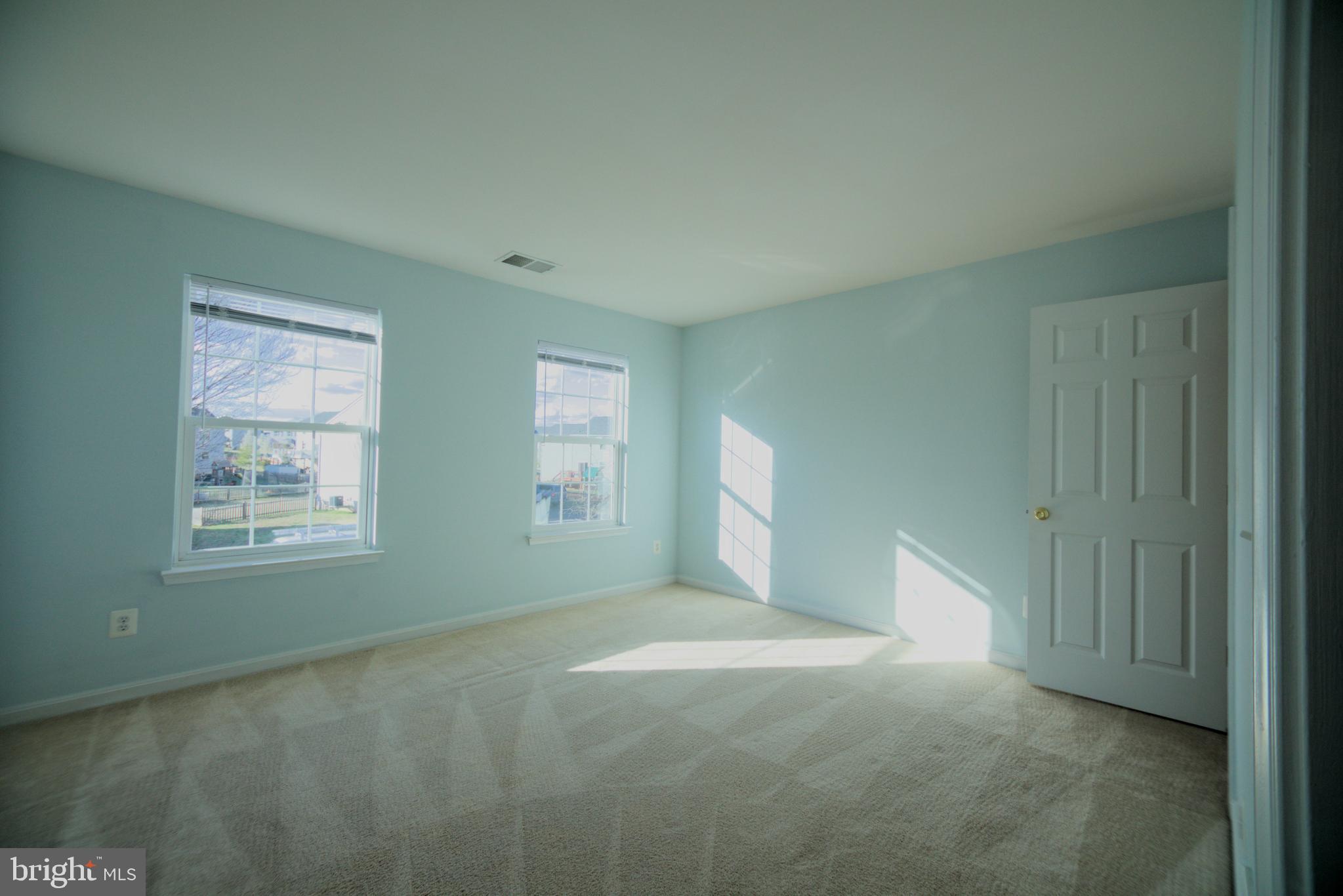 2443 Post Oak Drive Culpeper, VA 22701 - Photo 12 of 48 a view of an empty room with windows