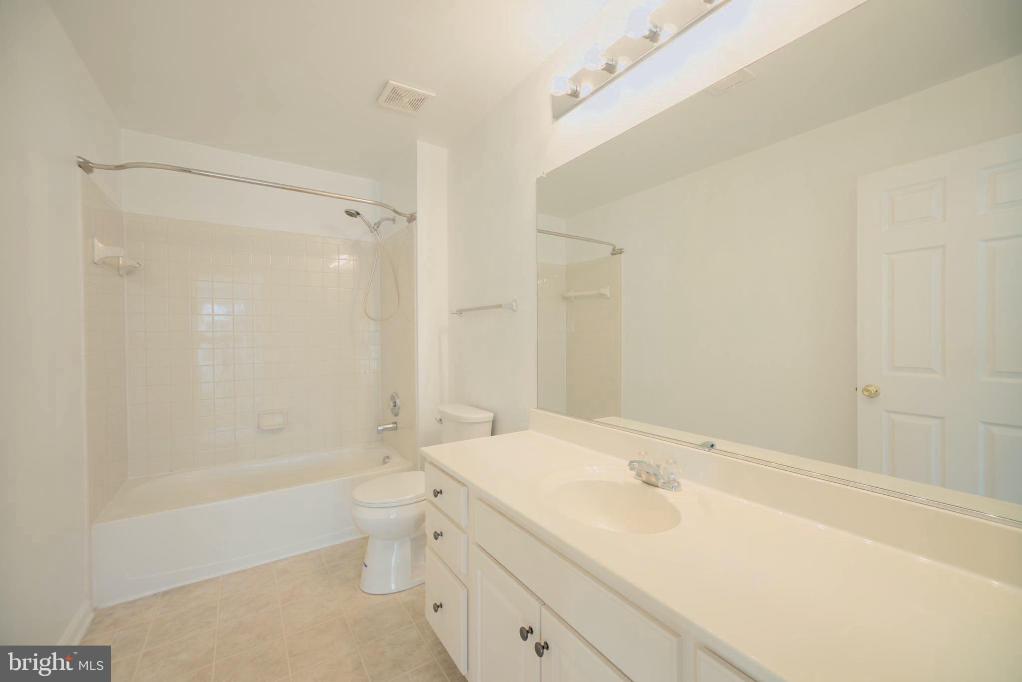 2443 Post Oak Drive Culpeper, VA 22701 - Photo 14 of 48 a bathroom with a sink a toilet and shower