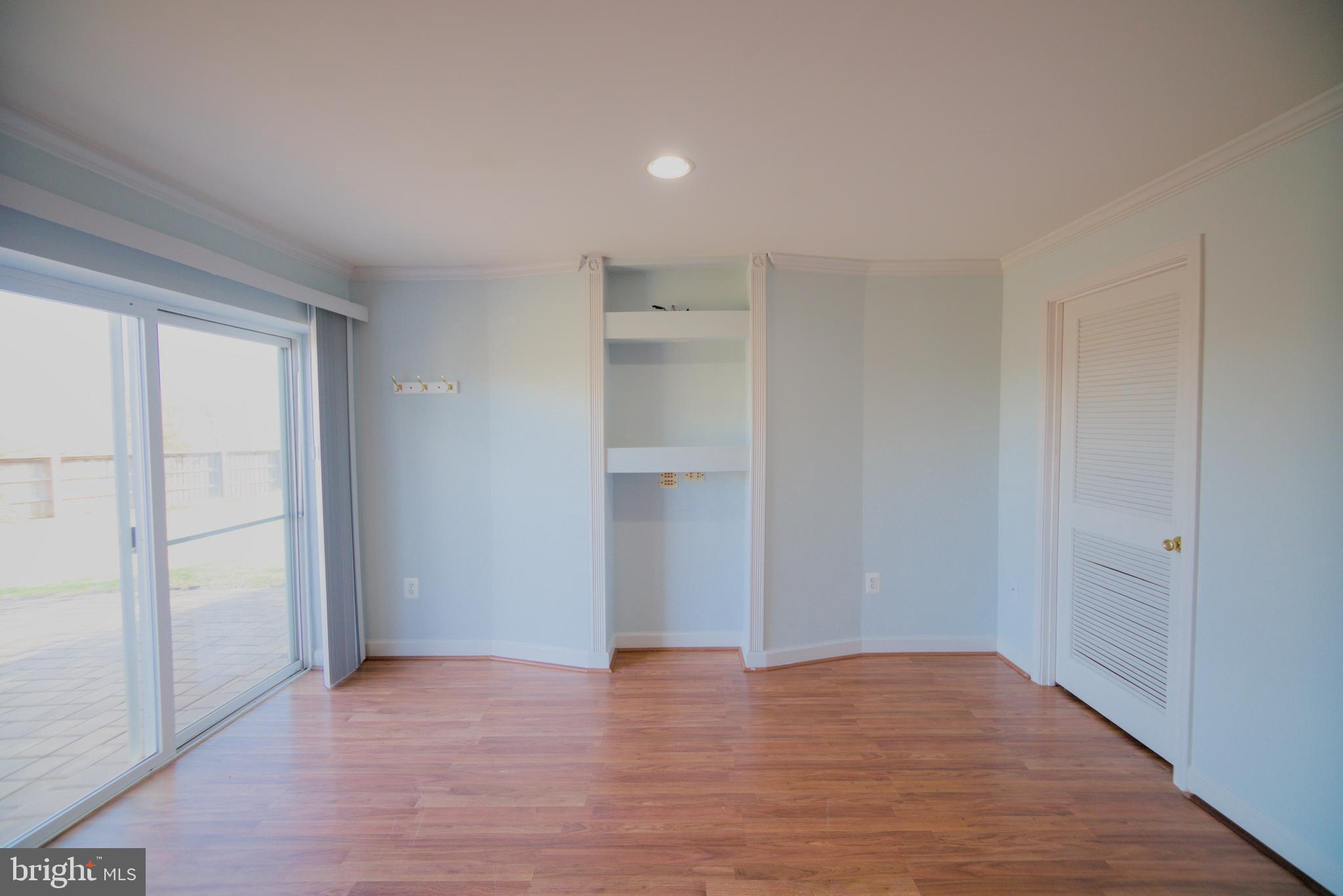 2443 Post Oak Drive Culpeper, VA 22701 - Photo 20 of 48 a view of an empty room with wooden floor and a window