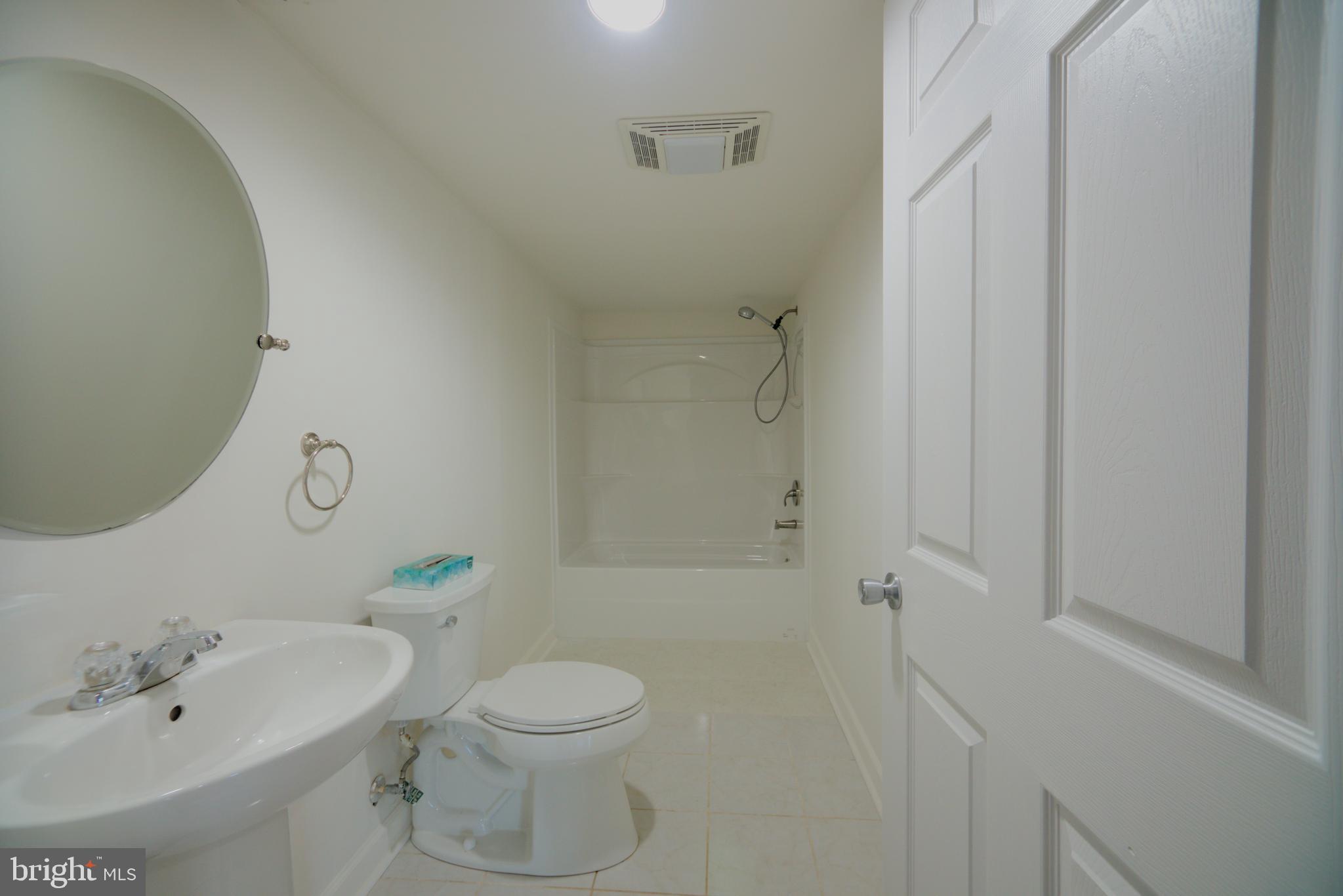 2443 Post Oak Drive Culpeper, VA 22701 - Photo 25 of 48 a bathroom with a sink a toilet and shower