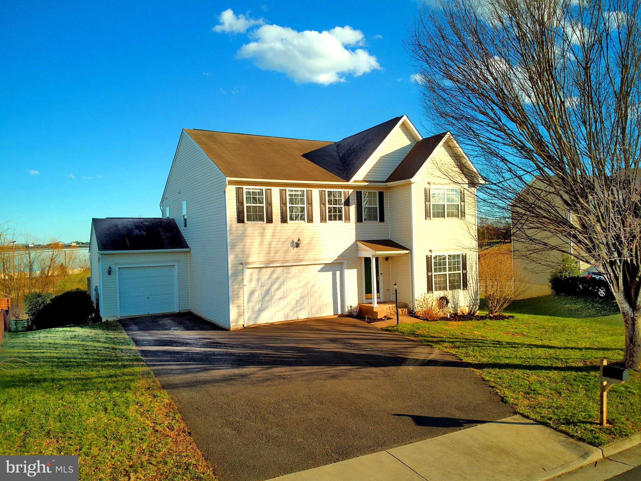 2443 Post Oak Drive Culpeper, VA 22701 - Photo 44 of 48 a front view of a house with a yard