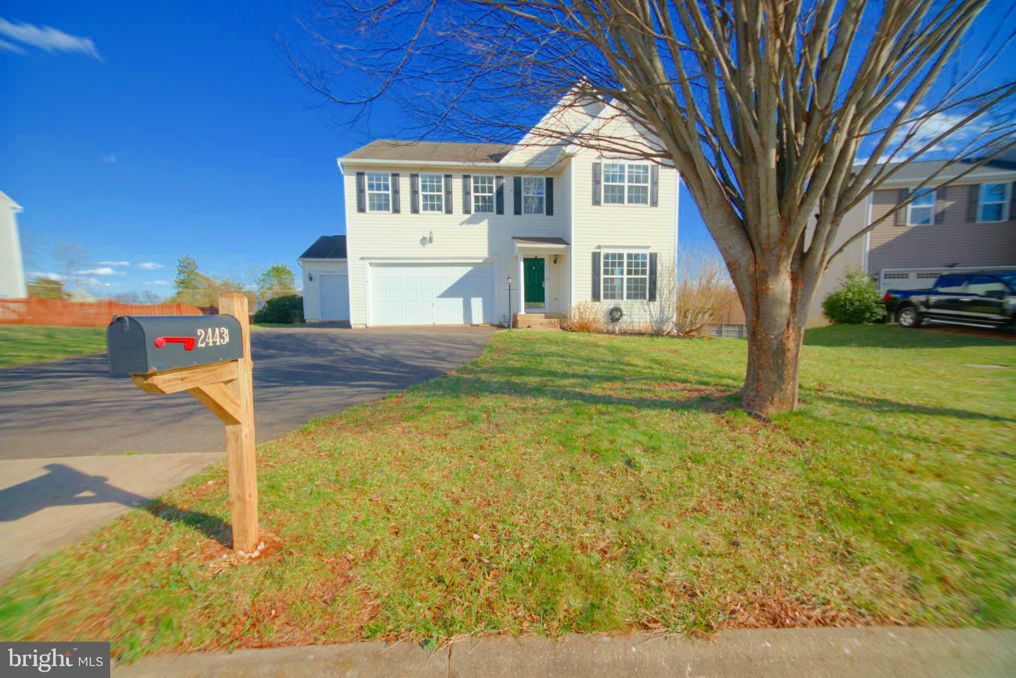 2443 Post Oak Drive Culpeper, VA 22701 - Photo 46 of 48 a front view of a house with a yard