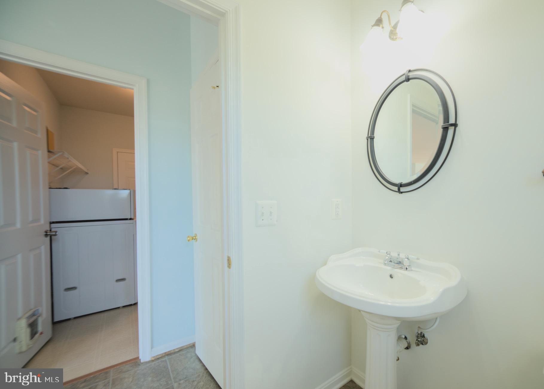 2443 Post Oak Drive Culpeper, VA 22701 - Photo 9 of 48 a bathroom with a sink and a mirror