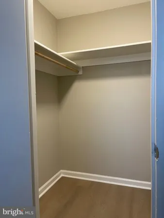 a white bath tub sitting next to a white toilet
