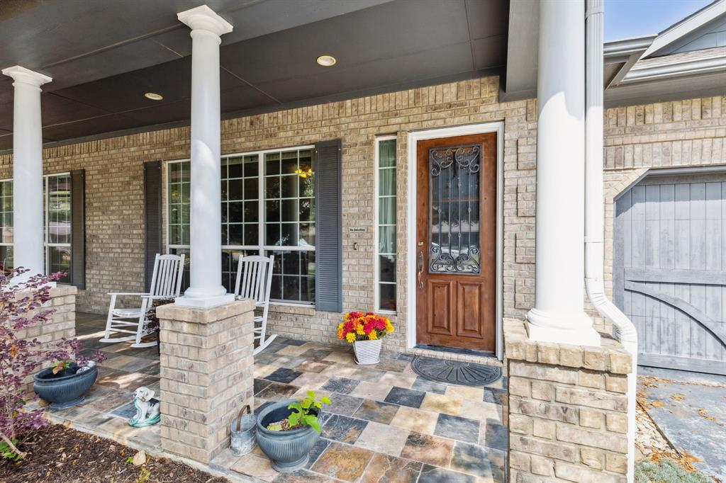 a front view of a building with seating space