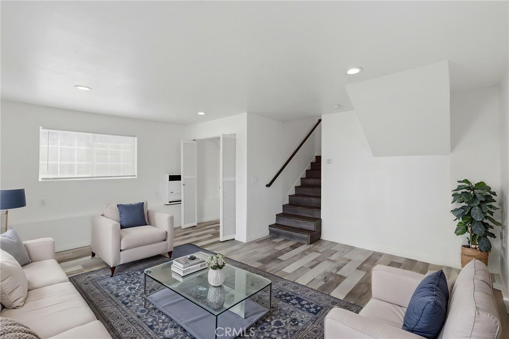 1311 West R Street Wilmington, CA 90744 - Photo 50 of 65 a living room with furniture and wooden floor