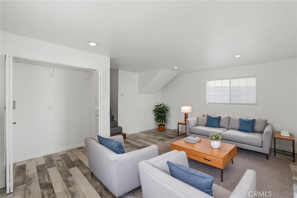 1311 West R Street Wilmington, CA 90744 - Photo 52 of 65 a living room with furniture and a couch