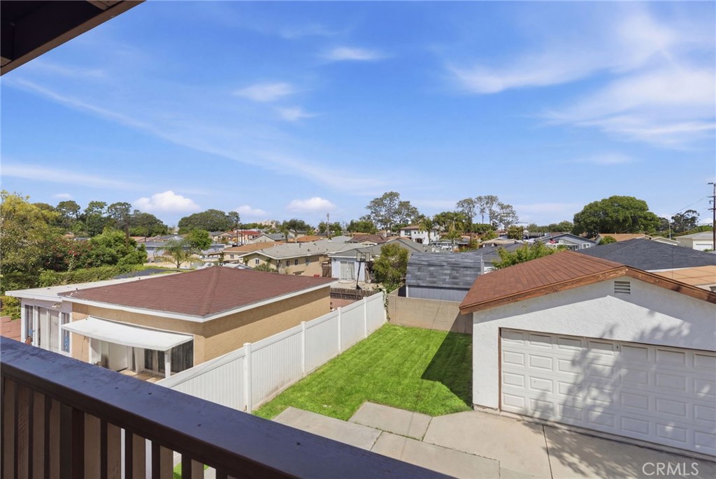 1311 West R Street Wilmington, CA 90744 - Photo 10 of 65 a front view of a house with a yard