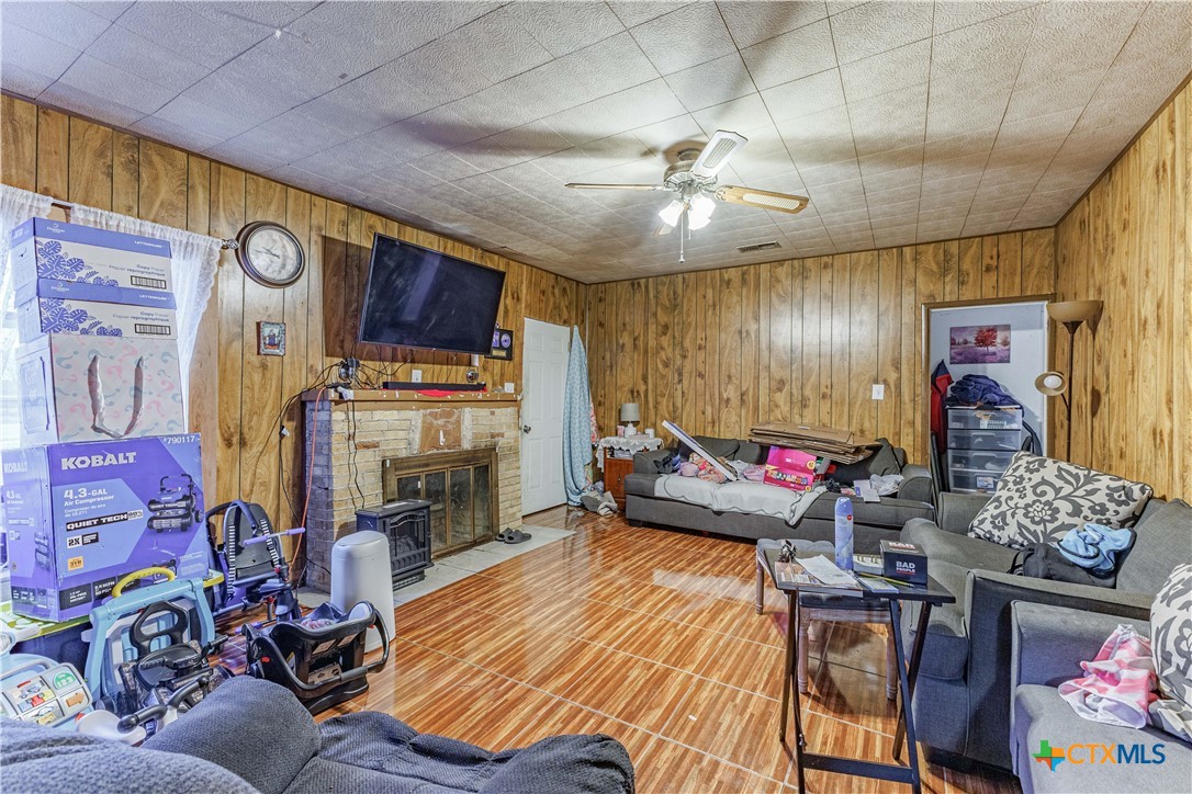 5472 Knob Creek Spur Temple, TX 76501 - Photo 11 of 27 a living room with furniture fireplace and flat screen tv