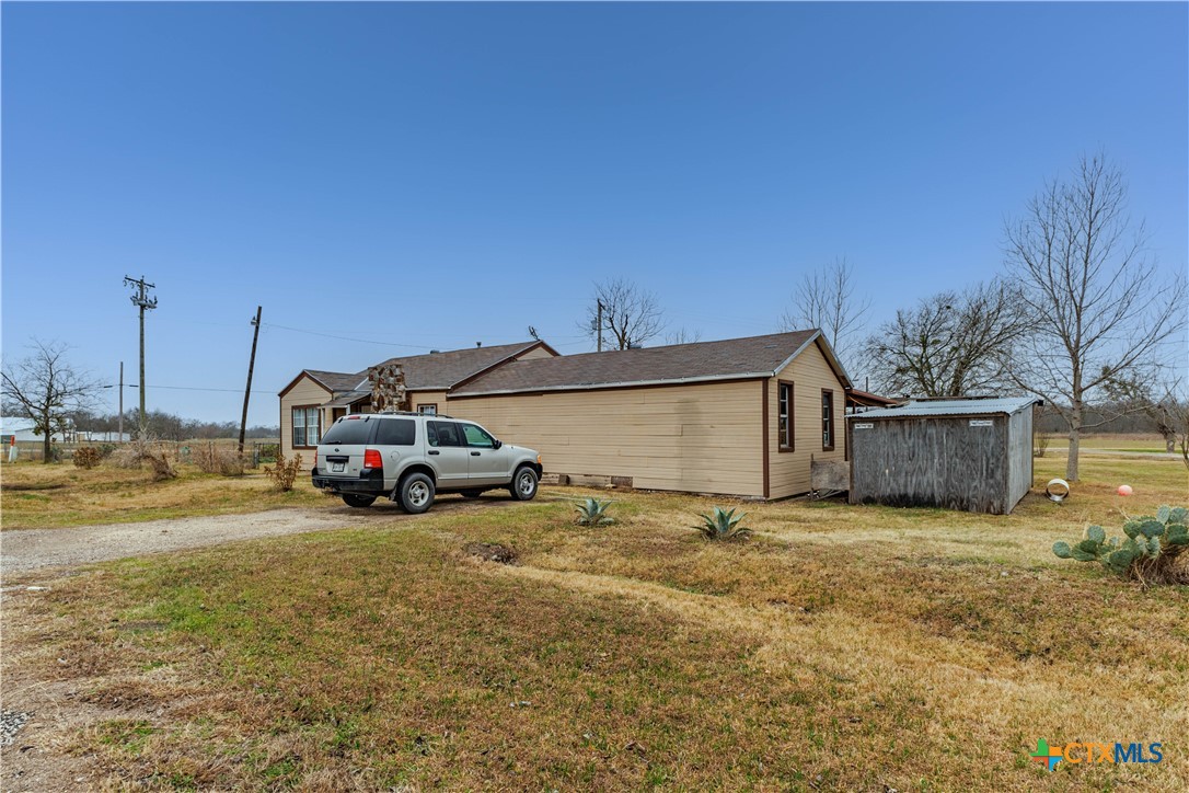 5472 Knob Creek Spur Temple, TX 76501 - Photo 25 of 27 a view of a house with a big yard and a car parked