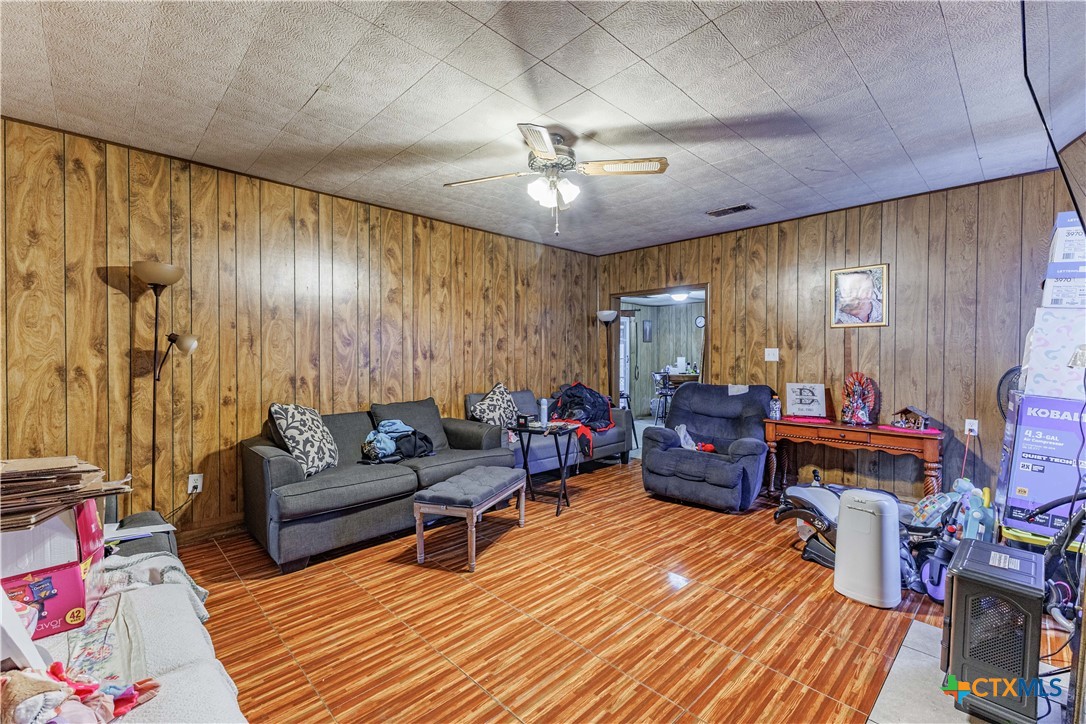 5472 Knob Creek Spur Temple, TX 76501 - Photo 8 of 27 a living room with furniture and a fireplace