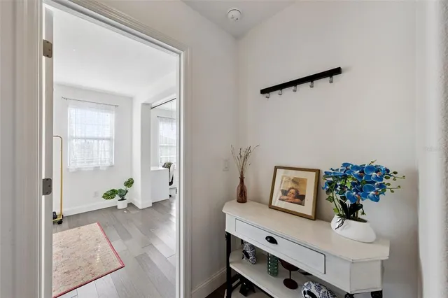 a view of livingroom with furniture wooden floor and window