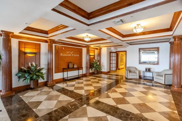 a building exterior with furniture and windows