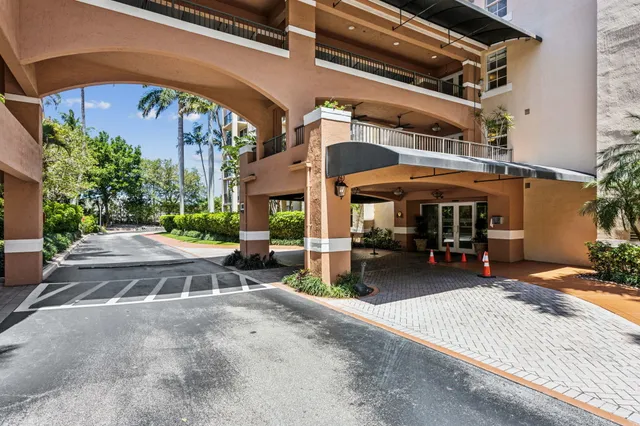 a view of a building with sitting area