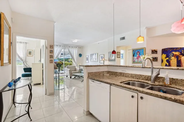 a kitchen with a sink cabinets and counter space