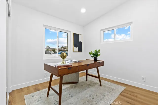 a view of a workspace with furniture