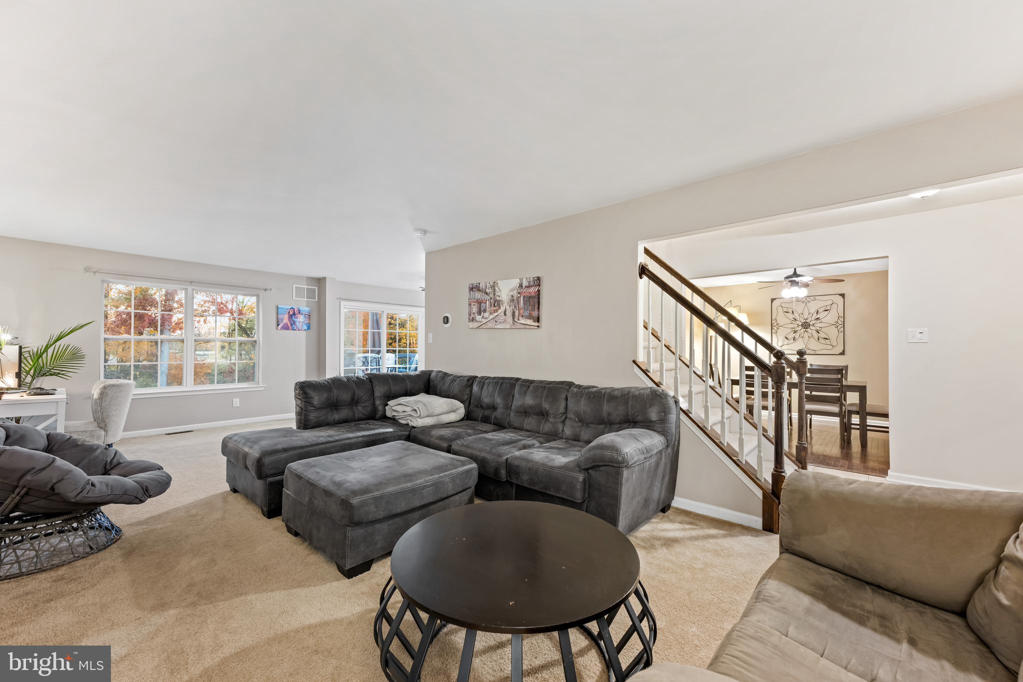 108 Nottingham Lane Newfield, NJ 08344 - Photo 19 of 39 a living room with furniture and a wooden floor
