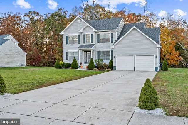 front view of house with a yard