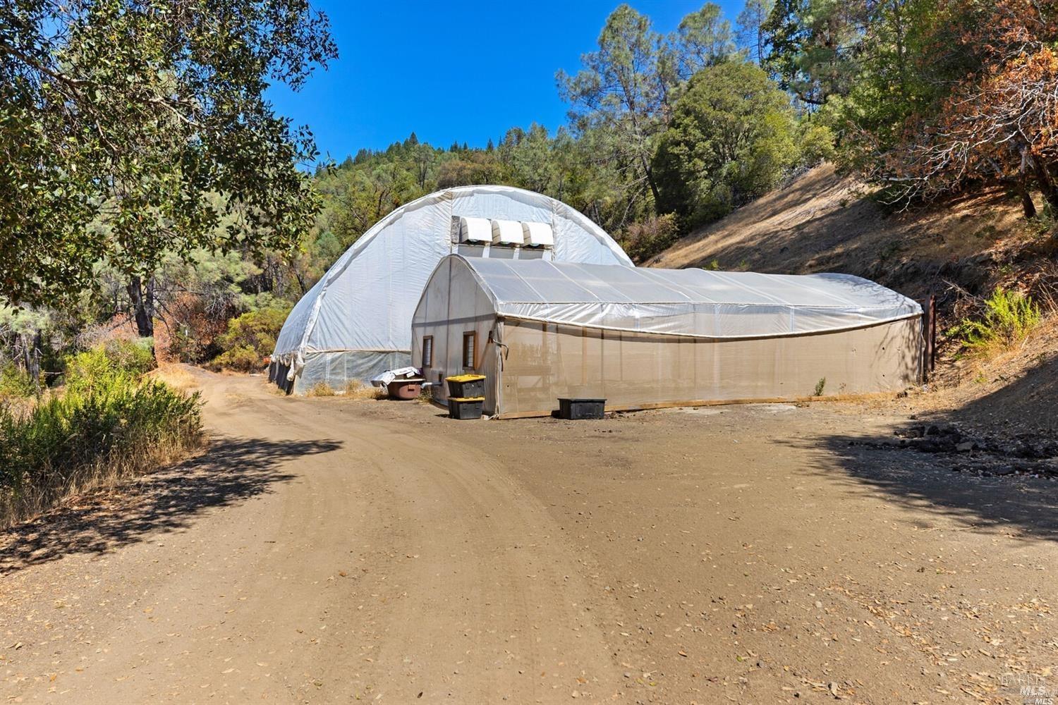 34010 Shimmins Ridge Road Willits, CA 95490 - Photo 41 of 56 Permitted greenhouses.