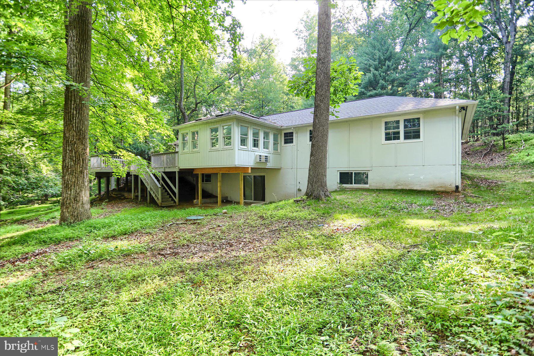 10902 Baronet Road Owings Mills, MD 21117 - Photo 38 of 42 a view of a house with a yard