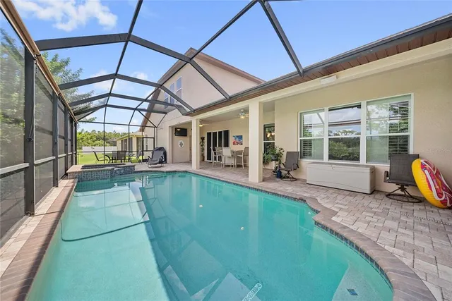 a view of a house with a swimming pool