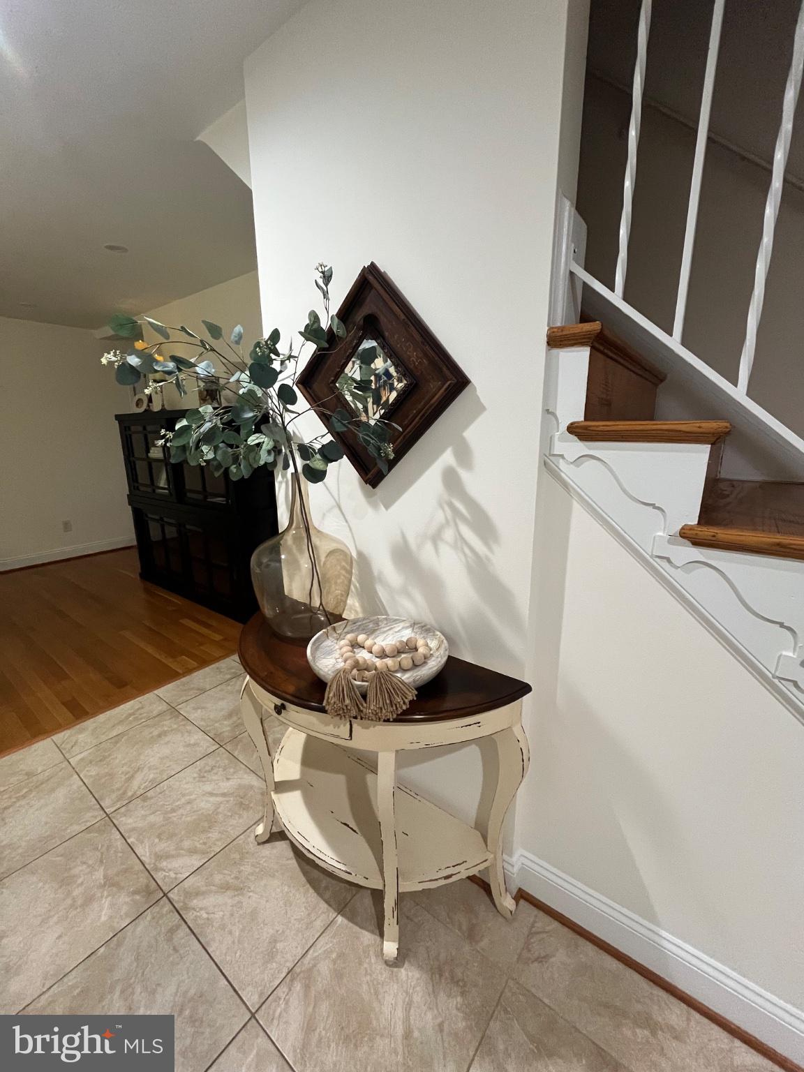 304 Old Courthouse Road Northeast Vienna, VA 22180 - Photo 7 of 25 Elegant entryway with stylish decor.