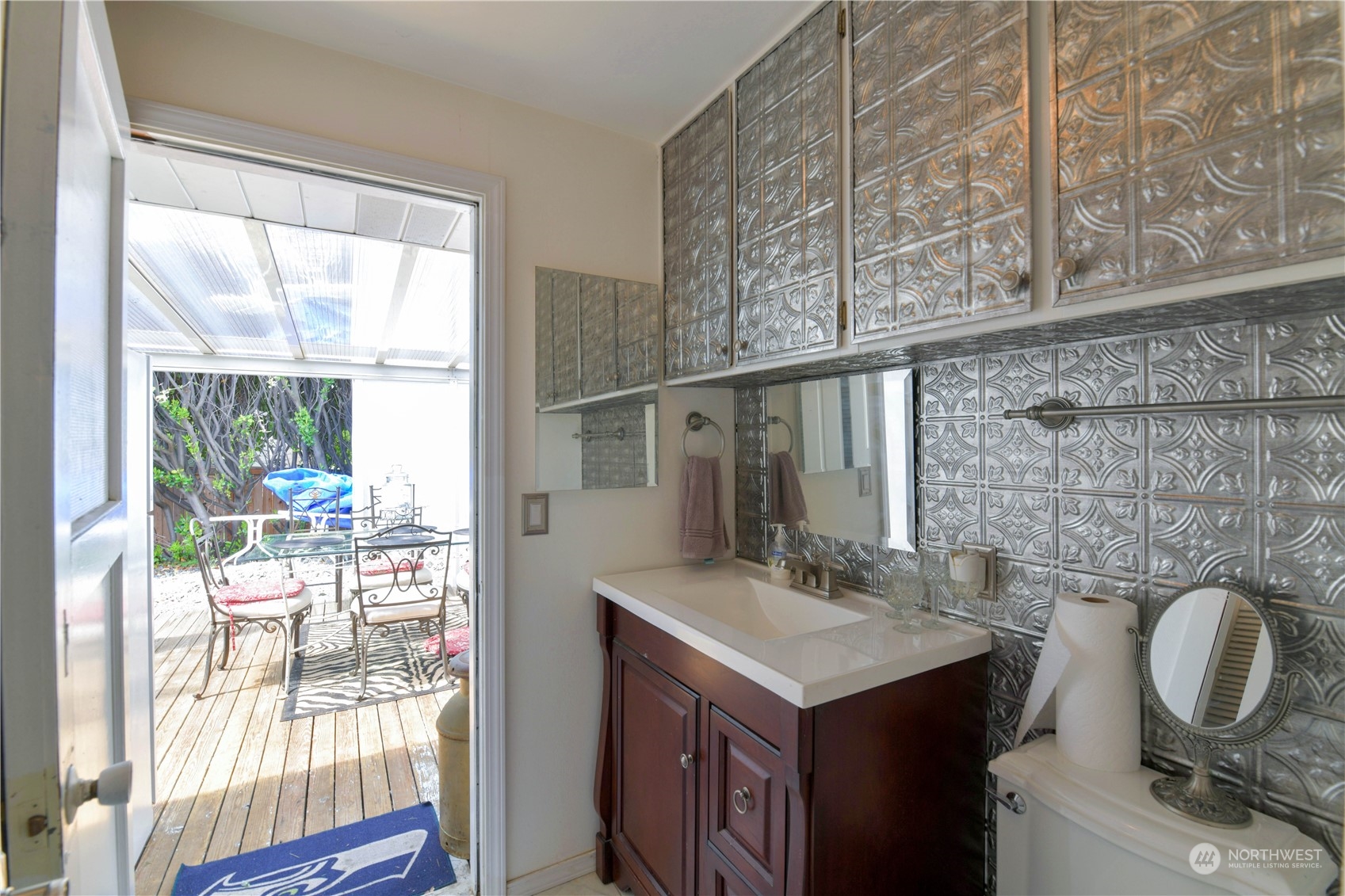 1151 Redmond Avenue Northeast Renton, WA 98056 - Photo 13 of 23 a bathroom with a sink and a mirror