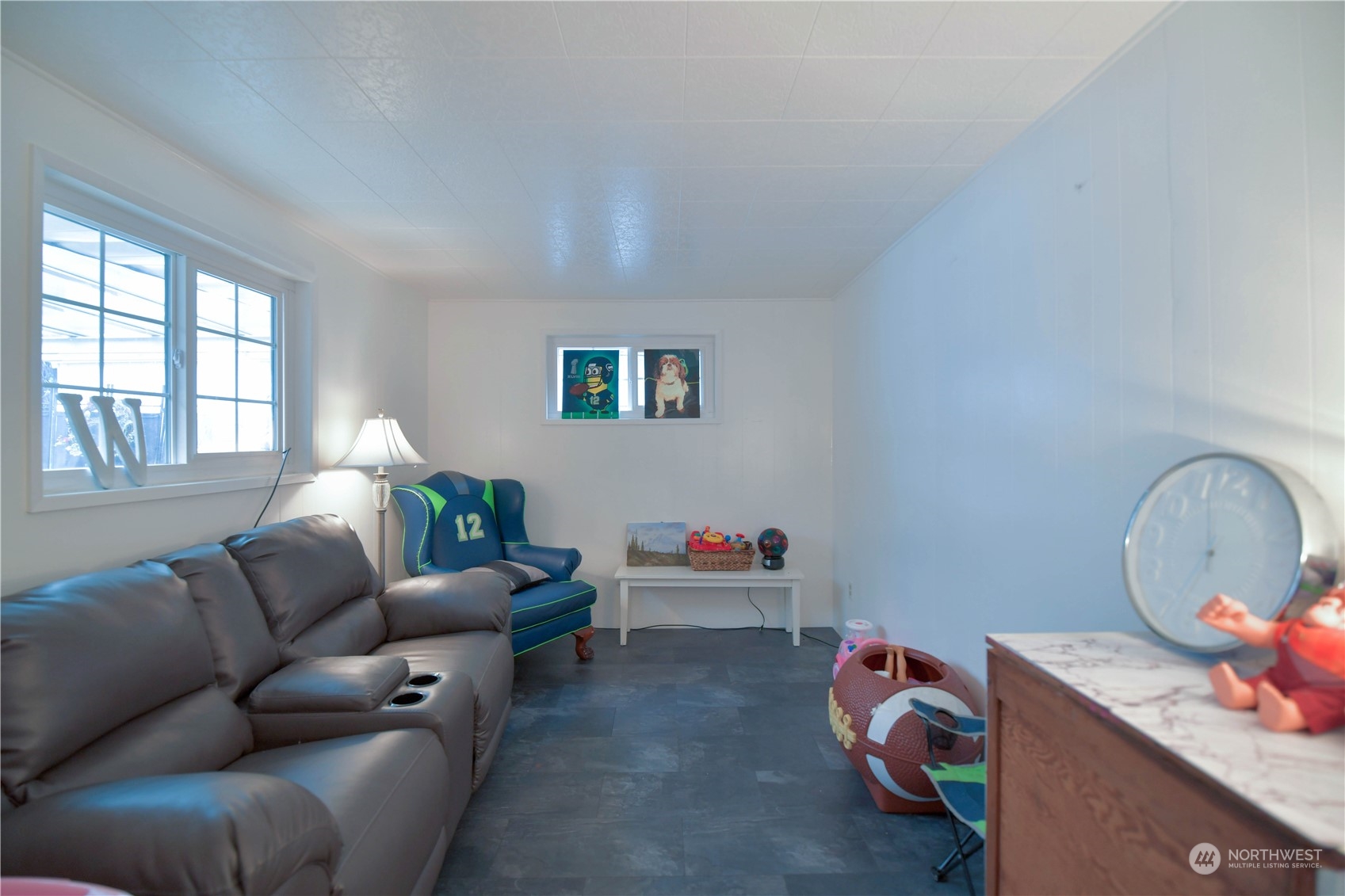 1151 Redmond Avenue Northeast Renton, WA 98056 - Photo 14 of 23 a living room with furniture and a window