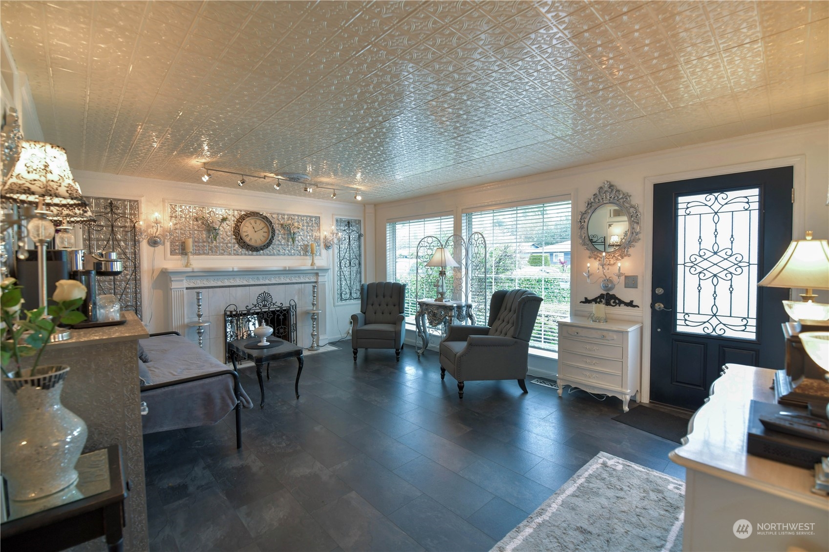 1151 Redmond Avenue Northeast Renton, WA 98056 - Photo 4 of 23 a living room with furniture and a fireplace