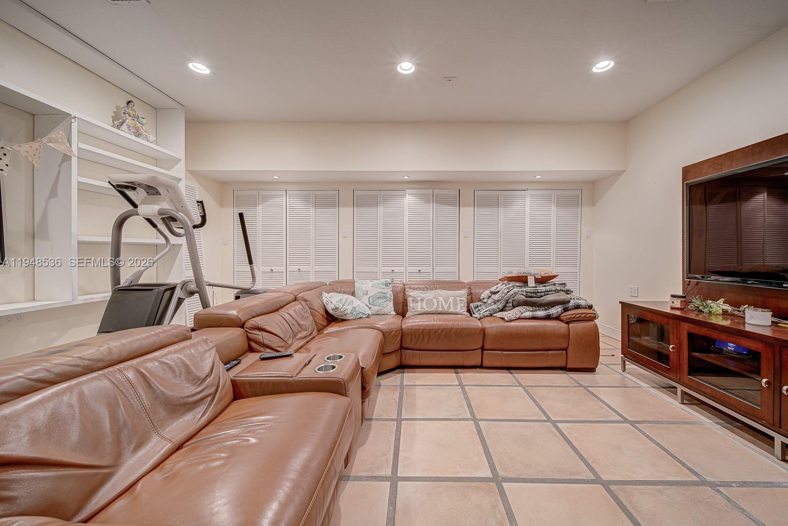 18128 Southwest 151st Avenue Miami, FL 33187 - Photo 17 of 39 a living room with furniture