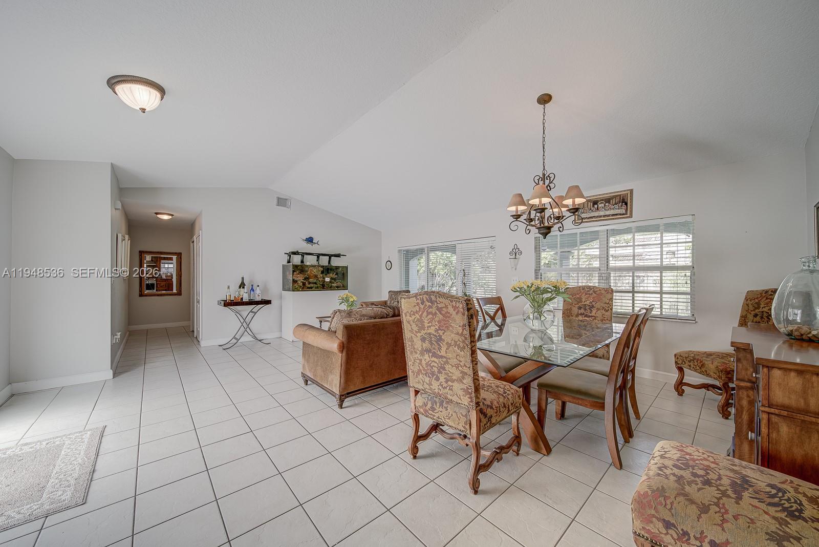 18128 Southwest 151st Avenue Miami, FL 33187 - Photo 29 of 39 a living room with furniture