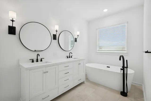 a view of room with window and bathroom