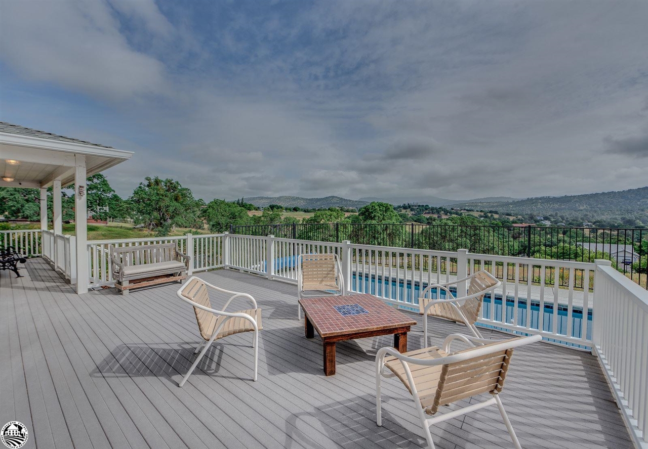 1618 Cheyenne Road Copperopolis, CA 95228 - Photo 24 of 30 a view of a chairs on wooden deck