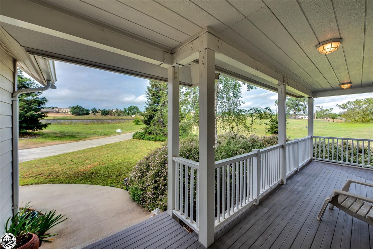 1618 Cheyenne Road Copperopolis, CA 95228 - Photo 3 of 30 a view of a porch with wooden floor and outdoor space