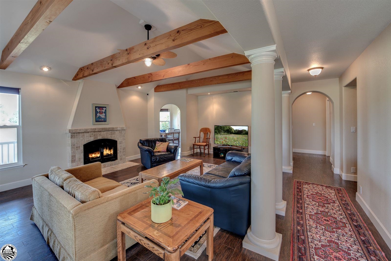 1618 Cheyenne Road Copperopolis, CA 95228 - Photo 5 of 30 a living room with furniture and a fireplace