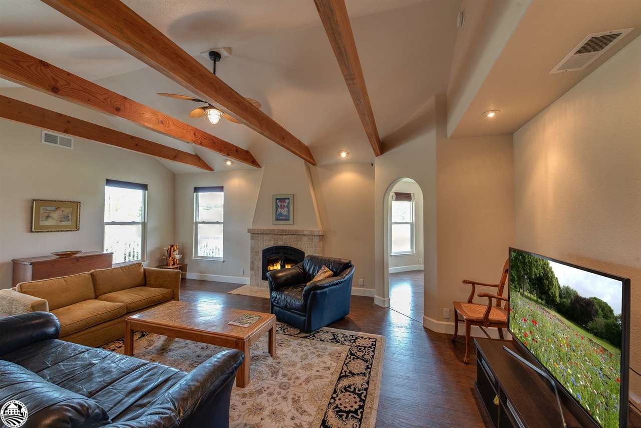 1618 Cheyenne Road Copperopolis, CA 95228 - Photo 6 of 30 a living room with furniture fireplace and flat screen tv