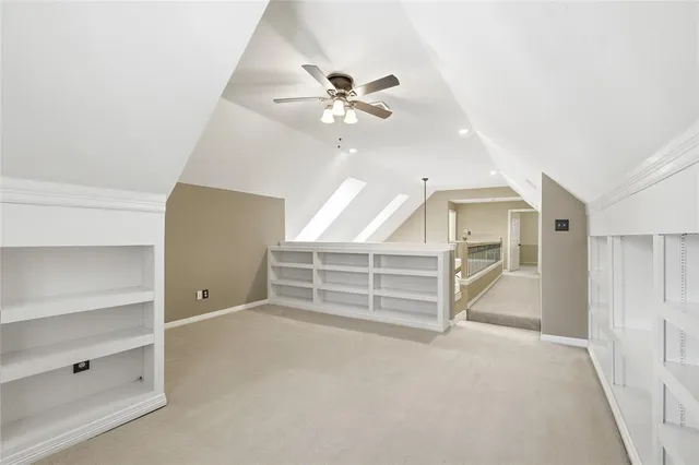 an empty room with a empty space and windows