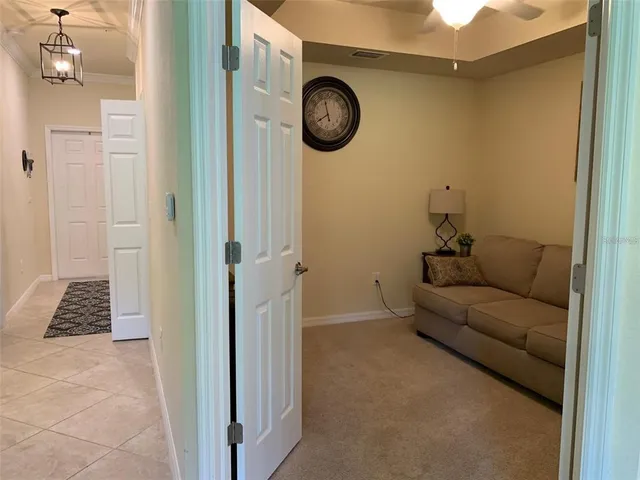 a view of livingroom with furniture and windows